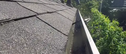 Gutter on asphalt roof